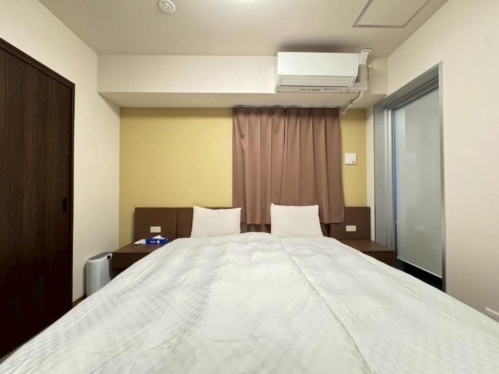 Sakura Sands Suites · primary bedroom
